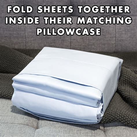 folding sheets into pillowcase.